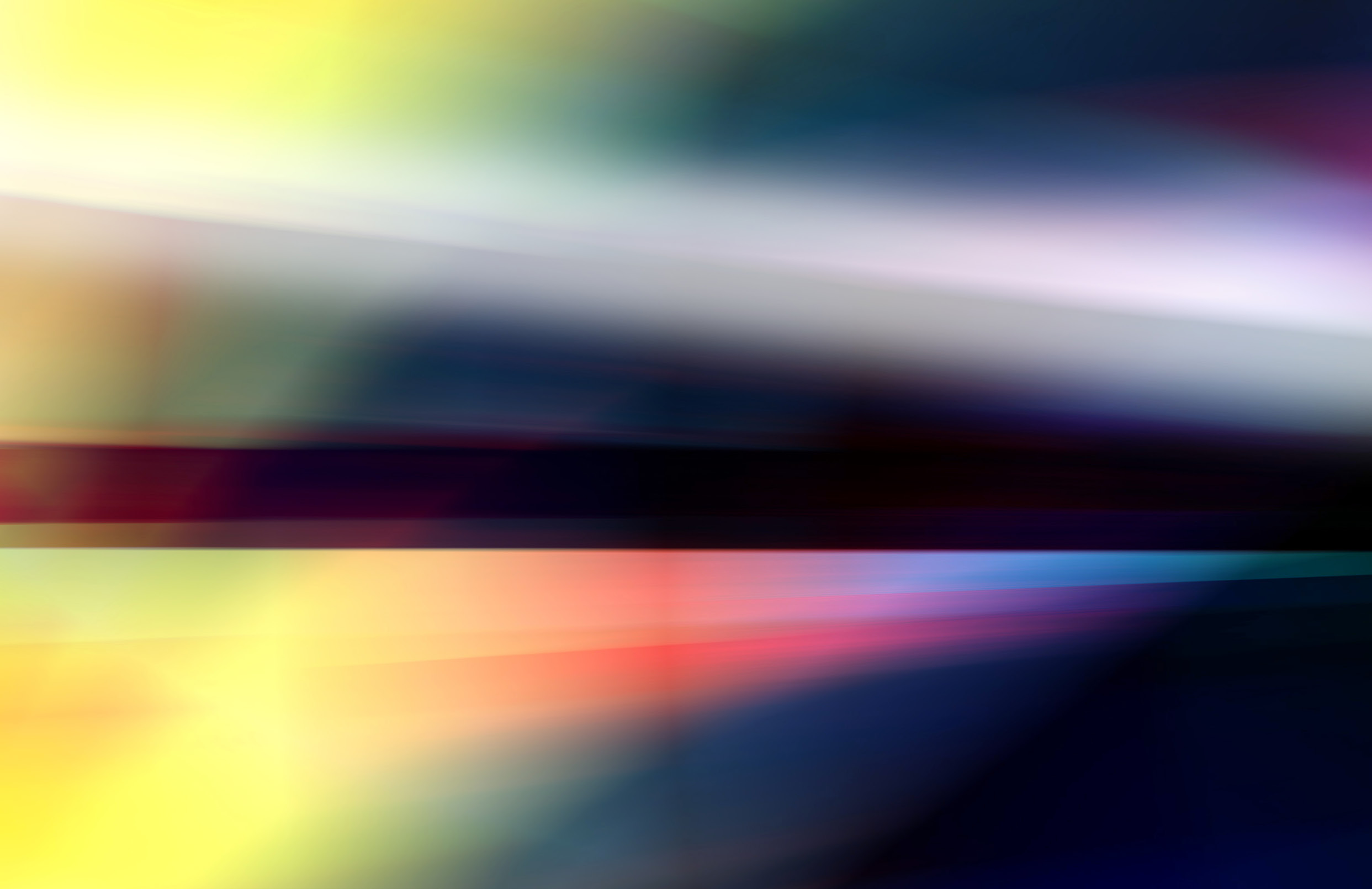 Streaks of blue and yellow light from the Enterprise in Motion company profile